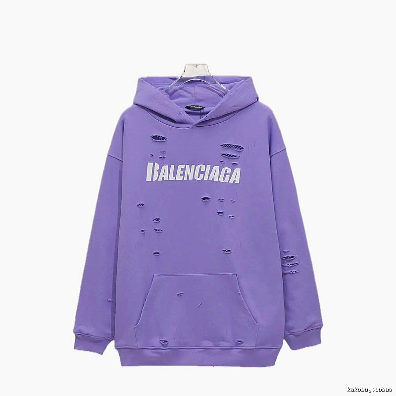 Balenciaga's ripped purple sweatshirt